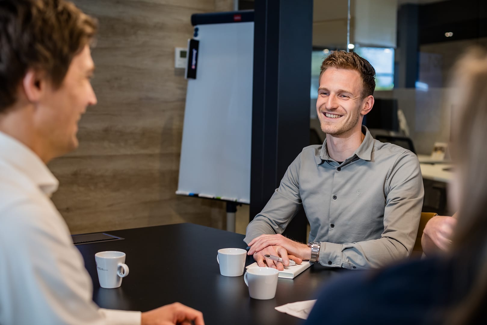 Engineer bij Overleg blij