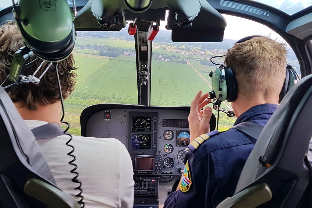 Een helikoptervlucht maken boven Nederland of Belgie
